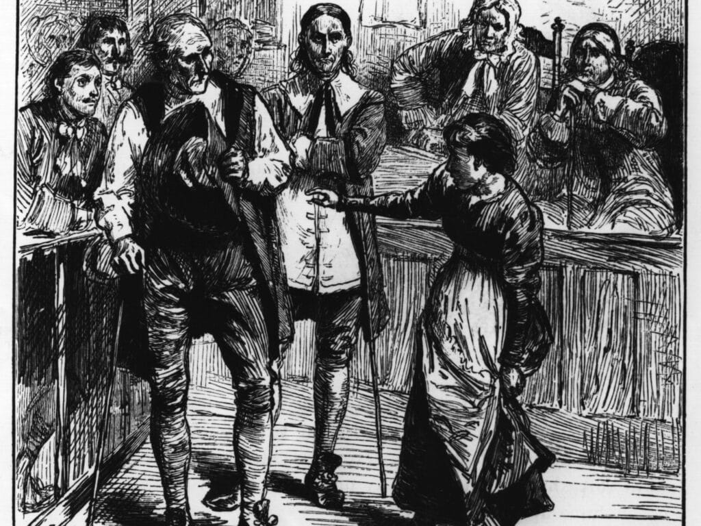 Giles Corey being accused of witchcraft